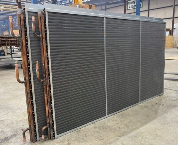 A copper tube, aluminum fin condenser coil.